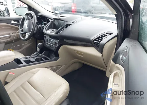 2017 Ford Escape Titanium z USA, uszkodzony, nr VIN 1FMCU0J95HUA75324